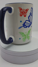 Load and play video in Gallery viewer, Tea Coffee Mug Ideal Gift Hand Printed Butterfly Design 15oz Blue Handle and Rim
