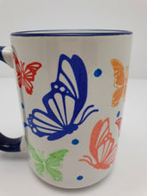 Load image into Gallery viewer, Tea Coffee Mug Ideal Gift Hand Printed Butterfly Design 15oz Blue Handle and Rim Butterfly Mug Harbourside Gifts
